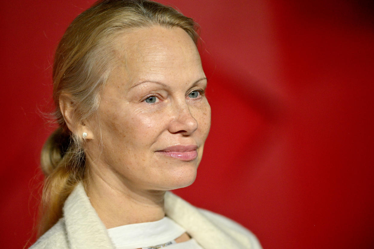 Pamela Anderson embraced a makeup-free look as the new face of Proenza Schouler. (Photo by Lionel Hahn/Getty Images) LONDON, ENGLAND - DECEMBER 4: Pamela Anderson attends The Fashion Awards 2023 presented by Pandora at the Royal Albert Hall on December 4, 2023 in London, England. (Photo by Lionel Hahn/Getty Images)