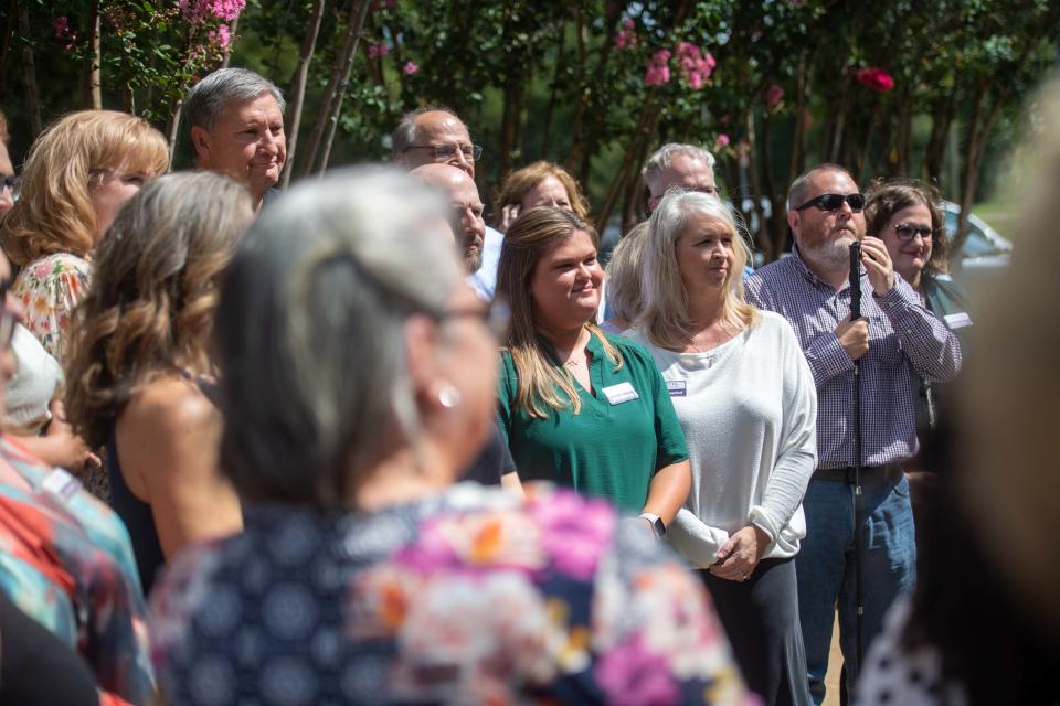 STAR Center employees gather as Gov. Bill Lee gives parting words after his visit as part of the Tennessee Serves Project in Jackson, Tennessee on Monday, Aug. 28, 2023.
