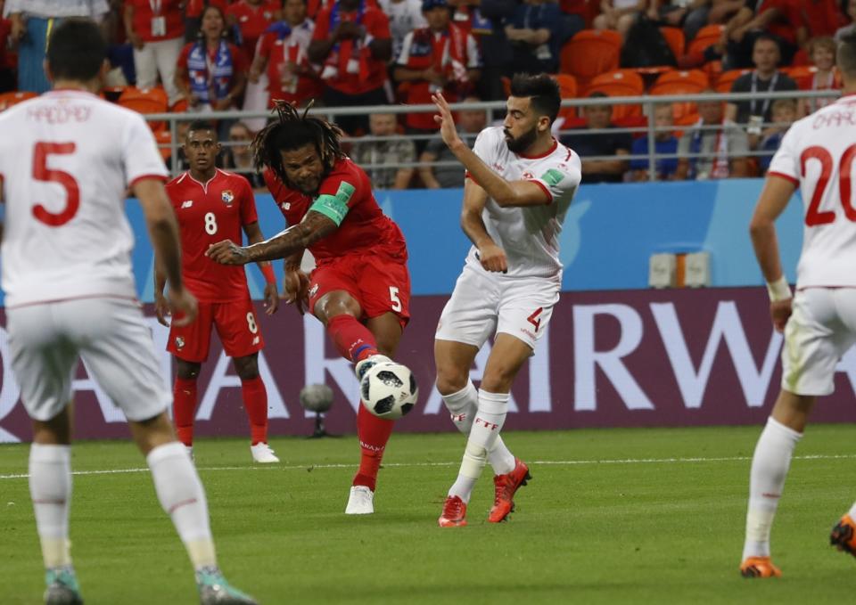 <p>Panama’s Roman Torres, left, takes a shot as Tunisia’s Yassine Meriah, right, scores with his own goal during the group G match between Panama and Tunisia at the 2018 soccer World Cup at the Mordovia Arena in Saransk, Russia, Thursday, June 28, 2018. (AP Photo/Darko Bandic) </p>