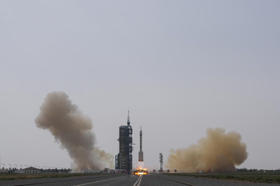 A Long March rocket carrying a crew of Chinese astronauts in a Shenzhou-16 spaceship lifts off at the Jiuquan Satellite Launch Center in northwestern China, Tuesday, May 30, 2023. (AP Photo/Mark Schiefelbein)