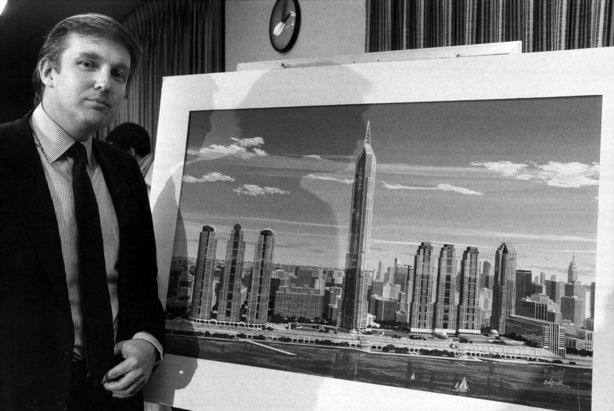 Donald Trump with a rendering of a proposed real estate development on the West Side of Manhattan on Feb. 28, 1986.  (Don Hogan Charles/The New York Times)