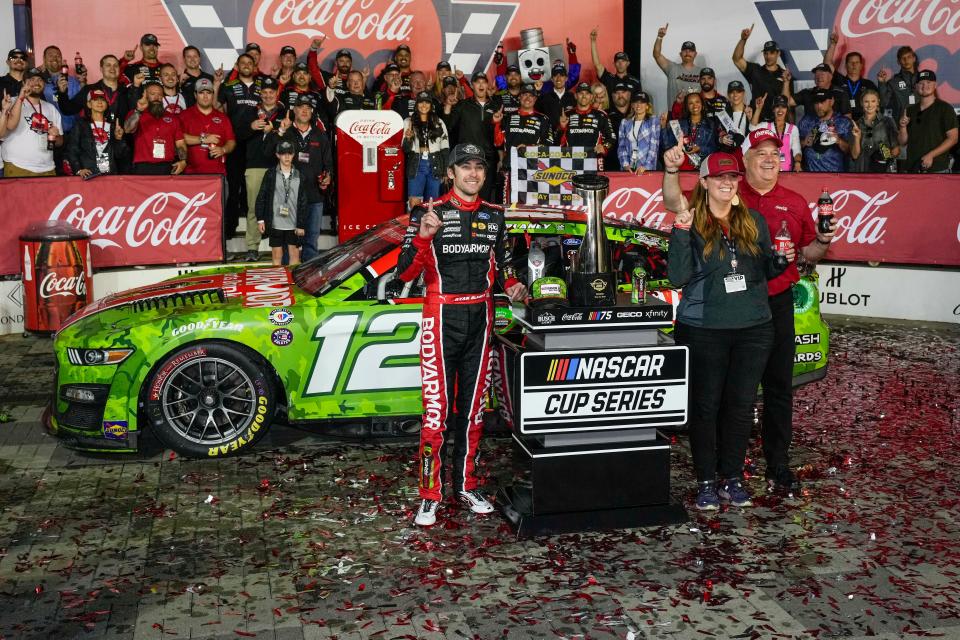 Ryan Blaney, left, celebrates winning the Coca-Cola 600 at Charlotte Motor Speedway.