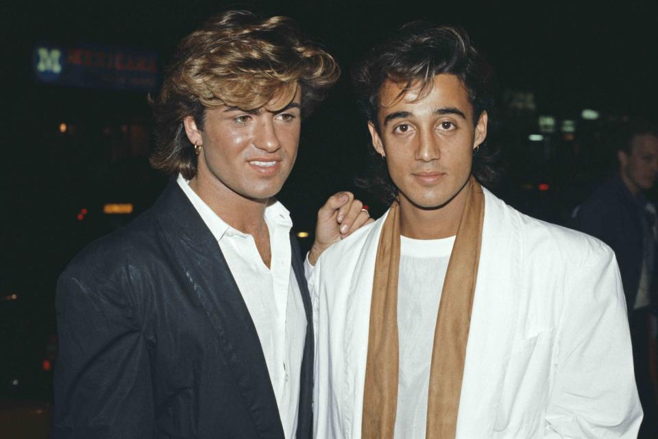 <p>Fox Photos/Hulton Archive/Getty</p> George Michael and Andrew Ridgeley of Wham!