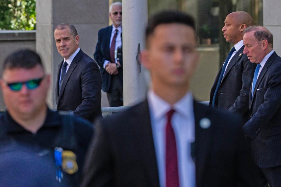 Hunter Biden and his legal team leave Delaware District Court where Biden faced felony gun charges in Wilmington, Tuesday, Oct. 3, 2023.