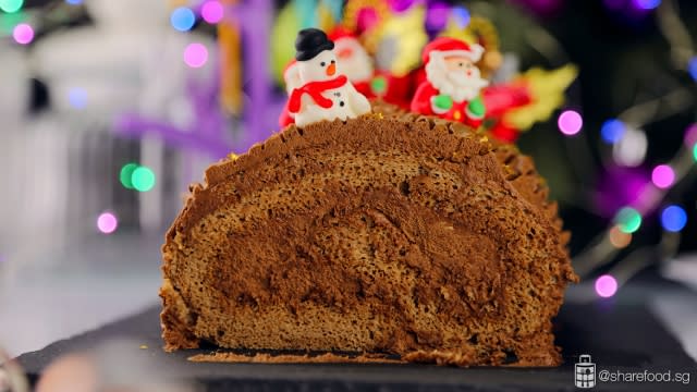 Slice of Chocolate and Coffee Christmas Log cake