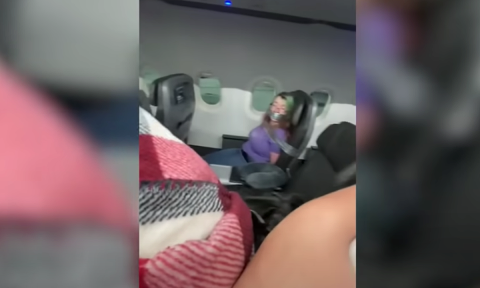 Heather Wells duct taped to her seat after she allegedly attacked crew members (tiktok)