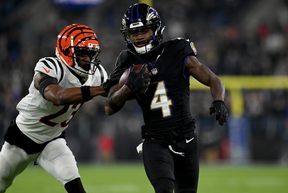 Nov 16, 2023; Baltimore, Maryland, USA; Baltimore Ravens wide receiver Zay Flowers (4) runs against Cincinnati Bengals safety Dax Hill (23) during the first quarter at M&T Bank Stadium. Mandatory Credit: Tommy Gilligan-USA TODAY Sports