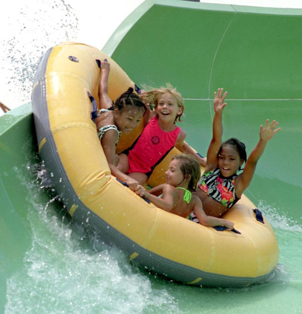 Visitors in 1999 enjoy the Tidal Wave ride at Carowinds.