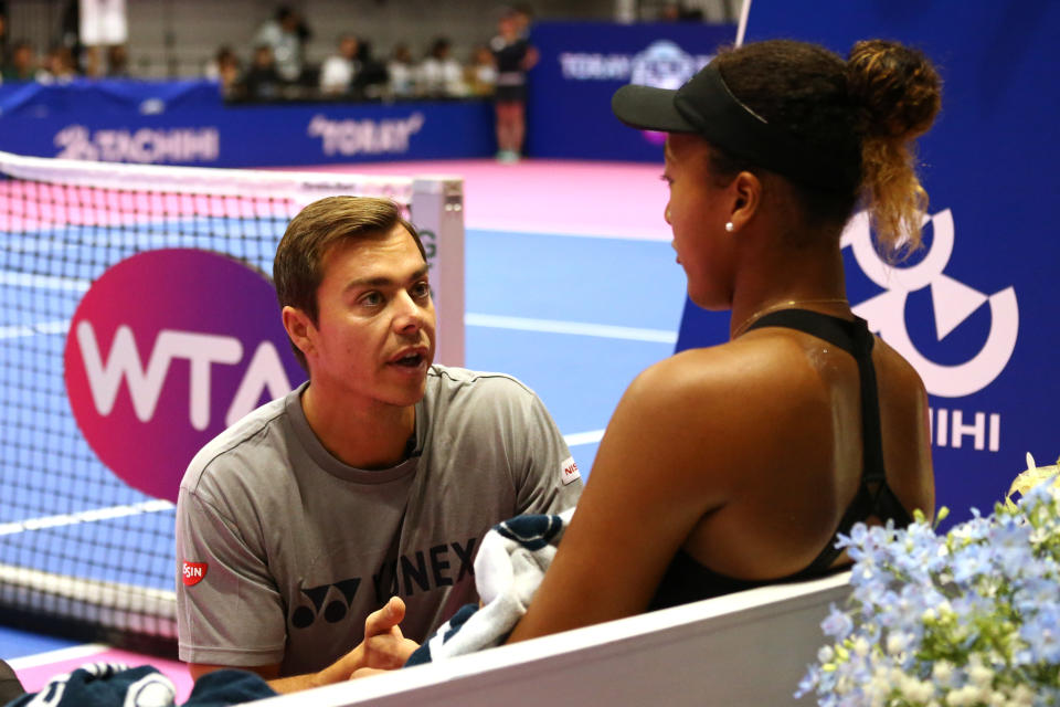 TACHIKAWA, JAPAN - SEPTEMBER 23: Naomi Osaka of Japan is talked by her coach Sascha Bajin in the final against Karolina Pliskova of the Czech Republic on day seven of the Toray Pan Pacific Open at Arena Tachikawa Tachihi on September 23, 2018 in Tachikawa, Tokyo, Japan. (Photo by Koji Watanabe/Getty Images)
