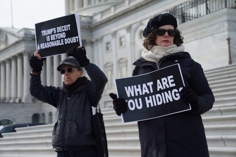 Demonstrators gather on Capitol Hill on day three of the impeachment trial of President Trump in Washington