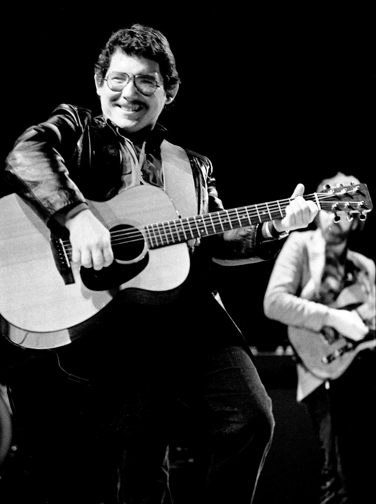 Russell Smith of the Amazing Rhythm Aces gives an energetic performance for the audience at the Municipal Auditorium Nov. 13, 1982.