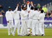 Britain Cricket - England v Sri Lanka - Second Test - Emirates Durham ICG - 27/5/16 Sri Lanka players celebrate the wicket of England's Alastair Cook Action Images via Reuters / Jason Cairnduff