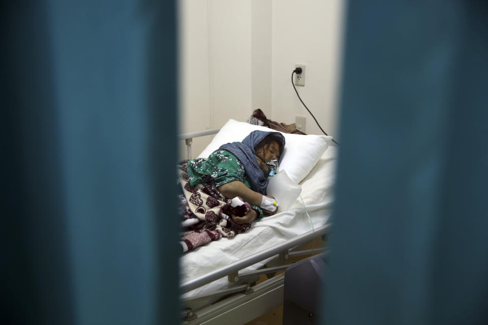 A patient is connected to oxygen tank in the Intensive Care Unit ward for COVID-19 patients at the Afghan-Japan Communicable Disease Hospital in Kabul, Afghanistan, Tuesday June 30, 2020. (AP Photo/Rahmat Gul)