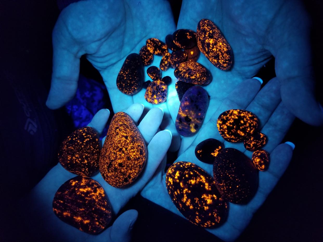 These glowing rocks found in Michigan's Upper Peninsula along the shores of Lake Peninsula are known as Yooperlites, but the term is trademarked.