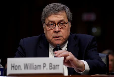 FILE PHOTO: William Barr testifies at the start of his U.S. Senate Judiciary Committee confirmation hearing on his nomination to be attorney general of the United States on Capitol Hill in Washington, U.S., January 15, 2019. REUTERS/Kevin Lamarque/File Photo