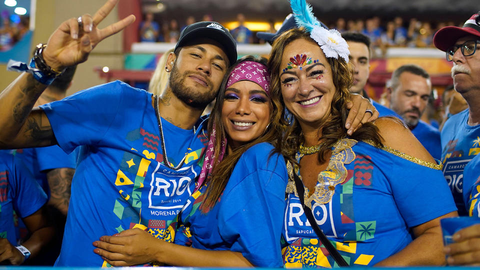 Neymar, pictured here with singer Anitta and mother Nadine Goncalves in 2019.