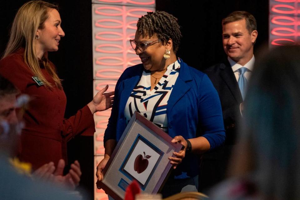 Cindy Desire Steven-Pheal, a teacher at Oak Grove Middle School, reacts as she receives her award during the 2024 Leo W. Seal Innovative Teacher Grants Awards Luncheon at the Great Southern Club in Gulfport on Friday, Jan. 26, 2024.