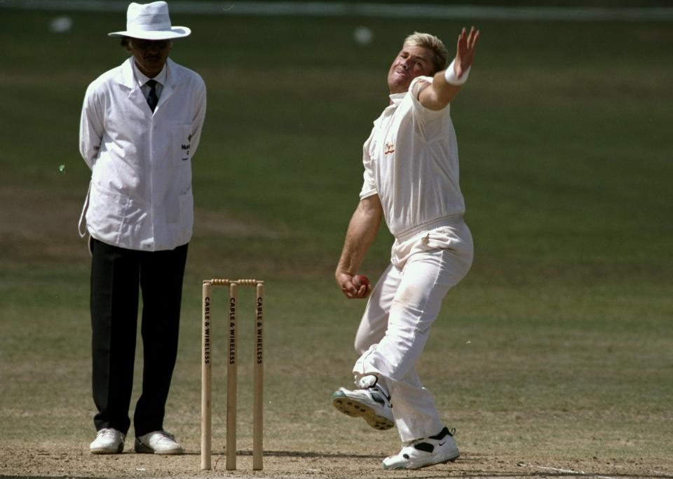 31 Mar 1995:  Shane Warne of Australia bowls during the First Test match against the West Indies at the Kensington Oval in Bridgetown, Barbados. \ Mandatory Credit: Clive Mason /Allsport