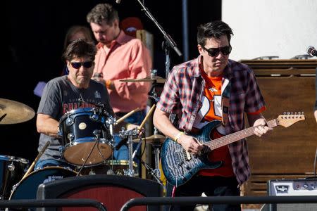 Feb 9, 2016; Denver, CO, USA; Members of the musical group Big Head Todd and the Monsters perform as part of the Denver Broncos championship parade at Civic Center Park. Mandatory Credit: Isaiah J. Downing-USA TODAY Sports