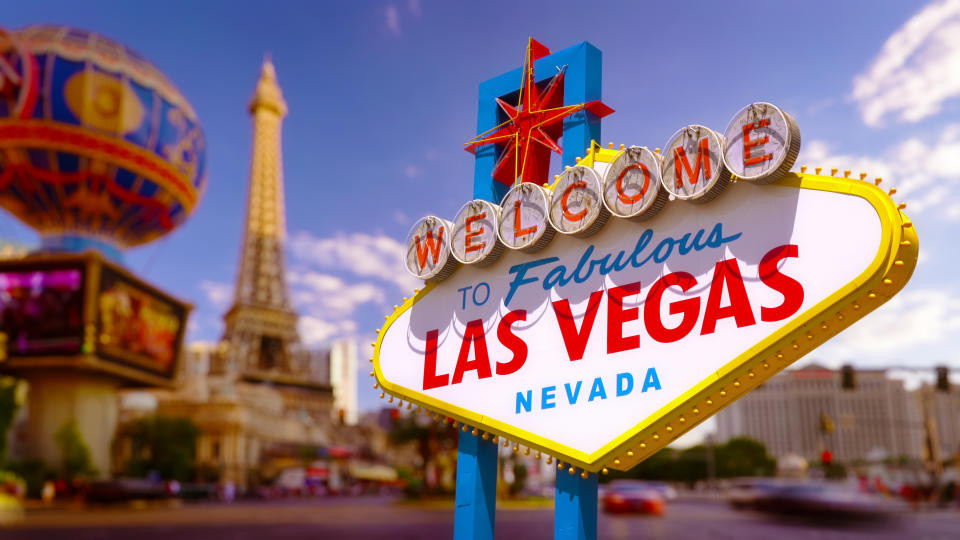 The well-known famous Las Vegas sign  in front of the Blurred Background. 
