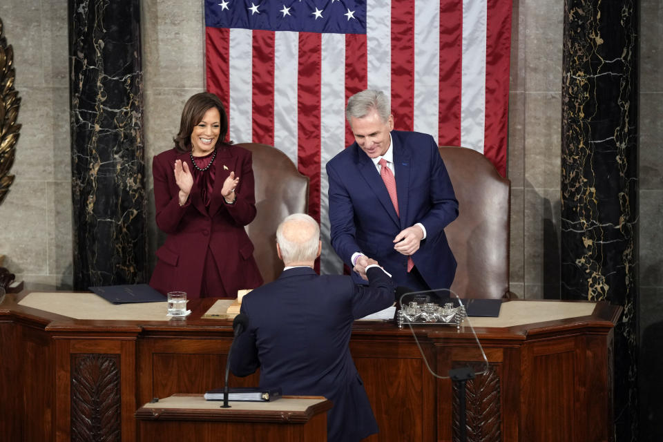 President Joe Biden shakes hands with House Speaker Kevin McCarthy of Calif., after he delivered the State of the Union address to a joint session of Congress at the U.S. Capitol, Tuesday, Feb. 7, 2023, in Washington. Vice President Kamala Harris applauds at left. (AP Photo/Patrick Semansky)
