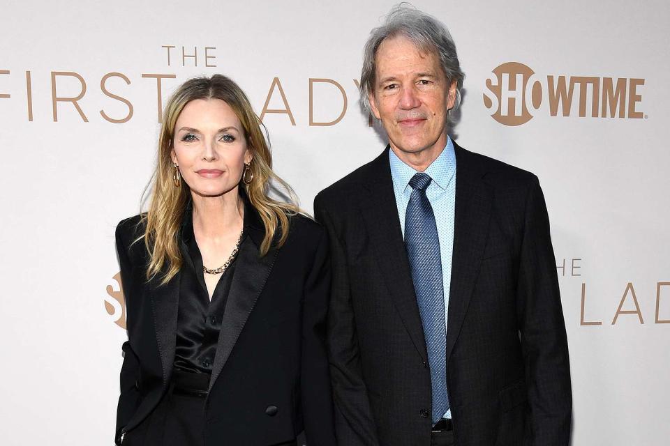 <p>Jon Kopaloff/Getty Images</p> Michelle Pfeiffer and David E. Kelley