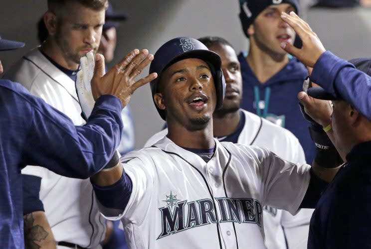 Jean Segura will be a member of the Mariners for five more years. (AP Photo)