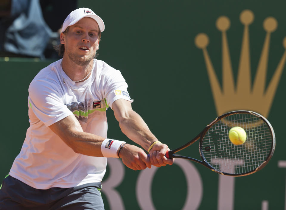 Andreas Seppi of Italy, returns the ball to Rafael Nadal of Spain during their third round match of the Monte Carlo Tennis Masters tournament in Monaco, Thursday, April 17, 2014. Nadal won 6-1 6-3. (AP Photo/Michel Euler)