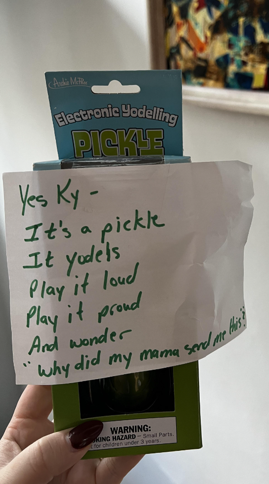 A yodeling pickle with a note from mom
