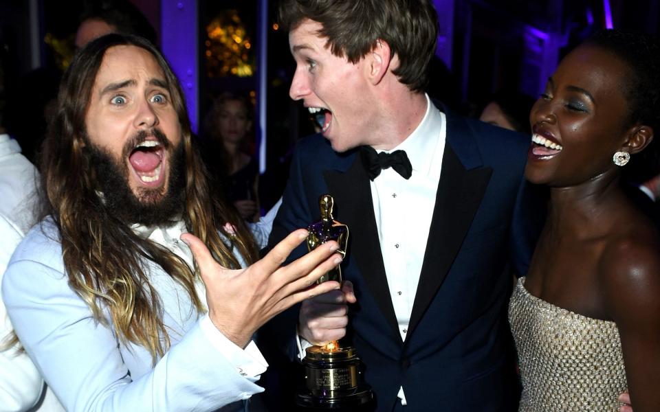 2015 Best Actor winner Eddie Redmayne with Best Supporting Actor Jared Leto - WireImage