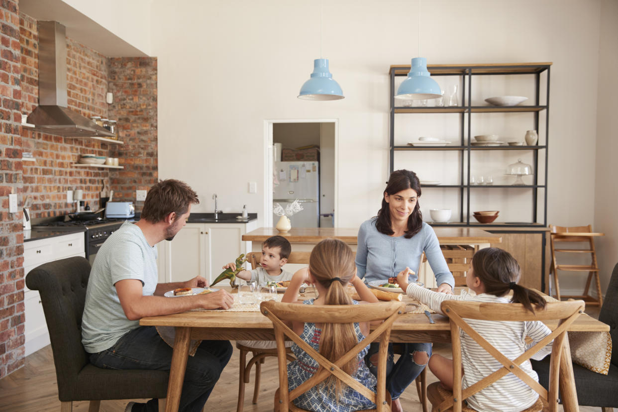 Less than a third of families still eat dinner together [Photo: Getty]