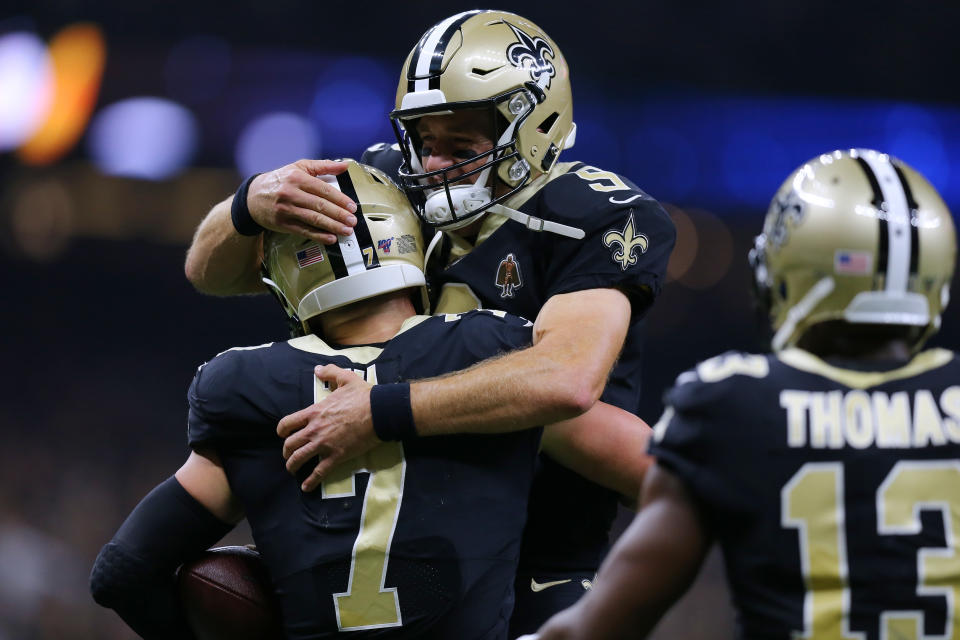 NEW ORLEANS, LOUISIANA - SEPTEMBER 09: Drew Brees #9 of the New Orleans Saints and Taysom Hill #7 celebrate a touchdown during the second half of a game against the Houston Texans at the Mercedes Benz Superdome on September 09, 2019 in New Orleans, Louisiana. (Photo by Jonathan Bachman/Getty Images)