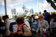 People walk across Tower Bridge in the financial district of London, Britain, September 23, 2018. REUTERS/Henry Nicholls