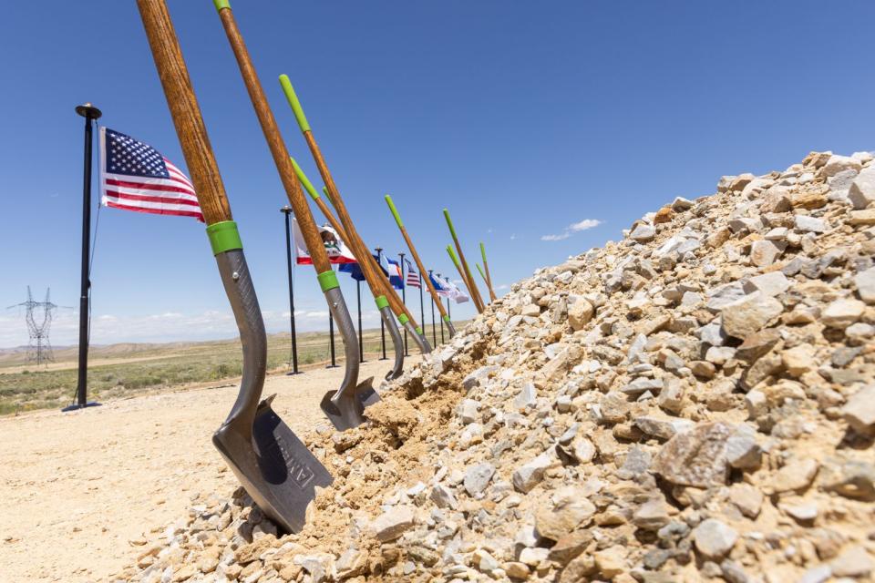 Representing the collaboration among states that led to the TWE Project groundbreaking, flags flying at the ceremony included Wyoming, Colorado, Utah, Nevada and California on June 20, 2023. As a nod to Wyoming and Western history, the shovels used at the groundbreaking were made by Ames, an American company founded in 1774. The Ames family helped finance the construction of the Union Pacific Railroad, which lies in the same linear corridor as the TWE Project in Wyoming. | Matthew Idler Photography