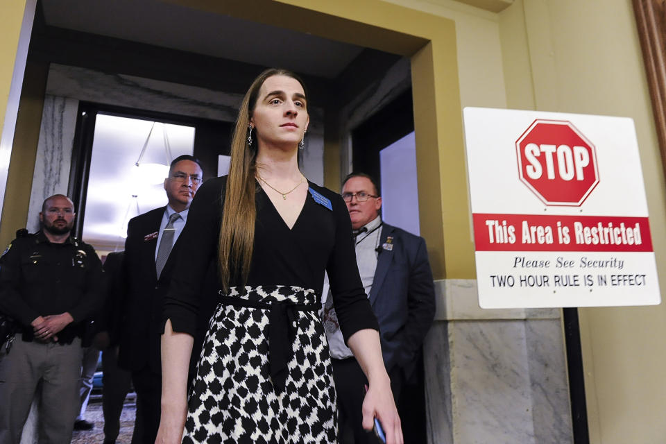 FILE - Rep. Zooey Zephyr, D-Missoula, walks out of the Montana House of Representatives after lawmakers voted to ban her from the chamber on April 26, 2023, in the State Capitol in Helena, Mont. Zephyr and legislative researcher Erin Reed have emerged as a power couple spreading hope to fellow transgender people. (Thom Bridge/Independent Record via AP, File)