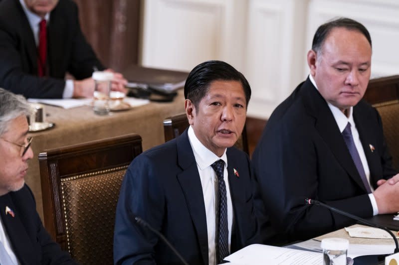 Ferdinand Marcos Jr., president of the Philippines, speaks during a trilateral meeting with President Joe Biden and Japanese Primer Minister Fumio Kishida in the East Room of the White House on Thursday. Biden said the U.S. has an "ironclad commitment to the Philippines and Japan as it counters an increasingly assertive China in the South China Sea. Photo by Al Drago/UPI