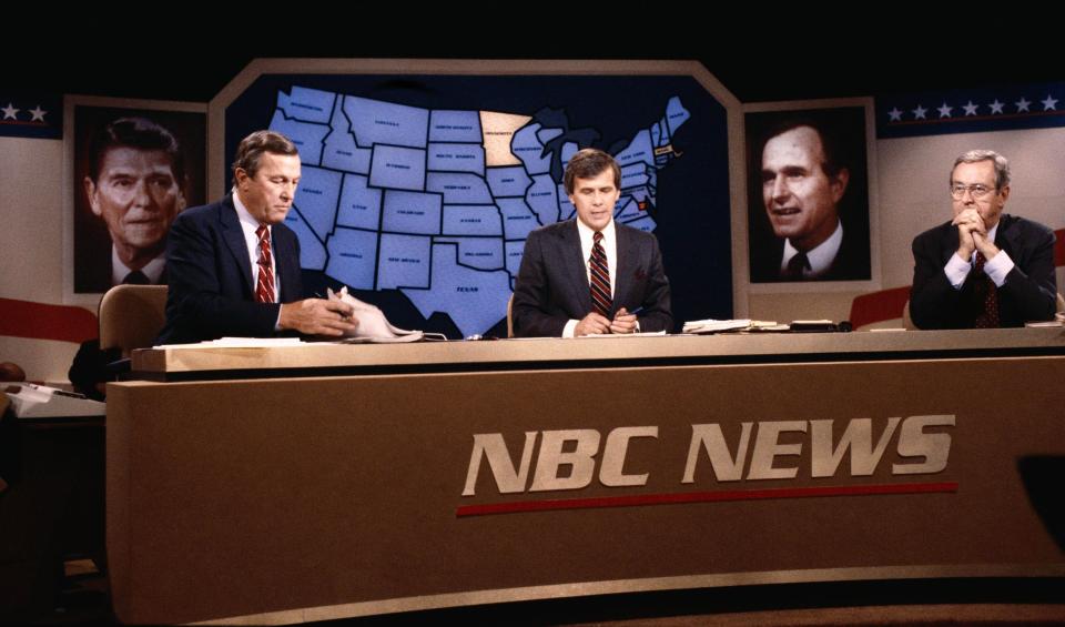 Tom Brokaw, center, with Roger Mudd, left, and John Chancellor on NBC News' election night desk in 1980.