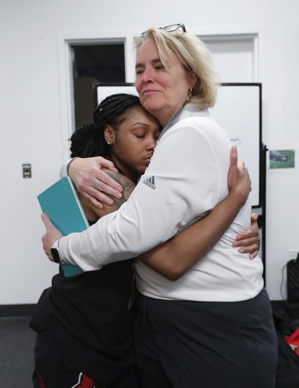 U of L associate head coach Stephanie Norman, right, is scheduled to be inducted into an inaugural Hall of Fame class in May.