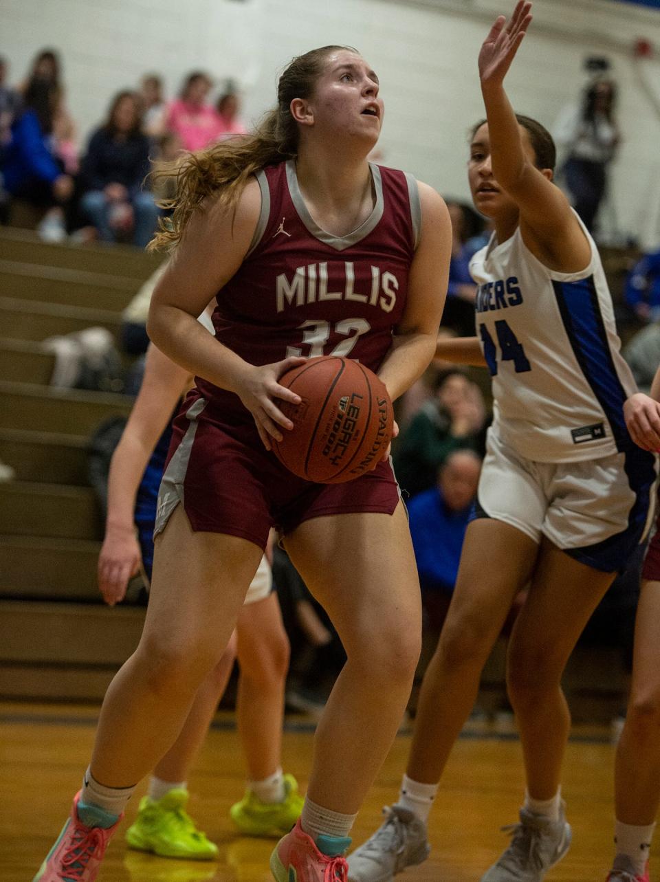 Millis High School senior captain Hailey Basset looks to score at Dover-Sherborn Regional High School, Feb. 2, 2024.