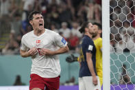 Denmark's Andreas Christensen celebrates after scoring his side's first goal during the World Cup group D soccer match between France and Denmark, at the Stadium 974 in Doha, Qatar, Saturday, Nov. 26, 2022. (AP Photo/Christophe Ena)