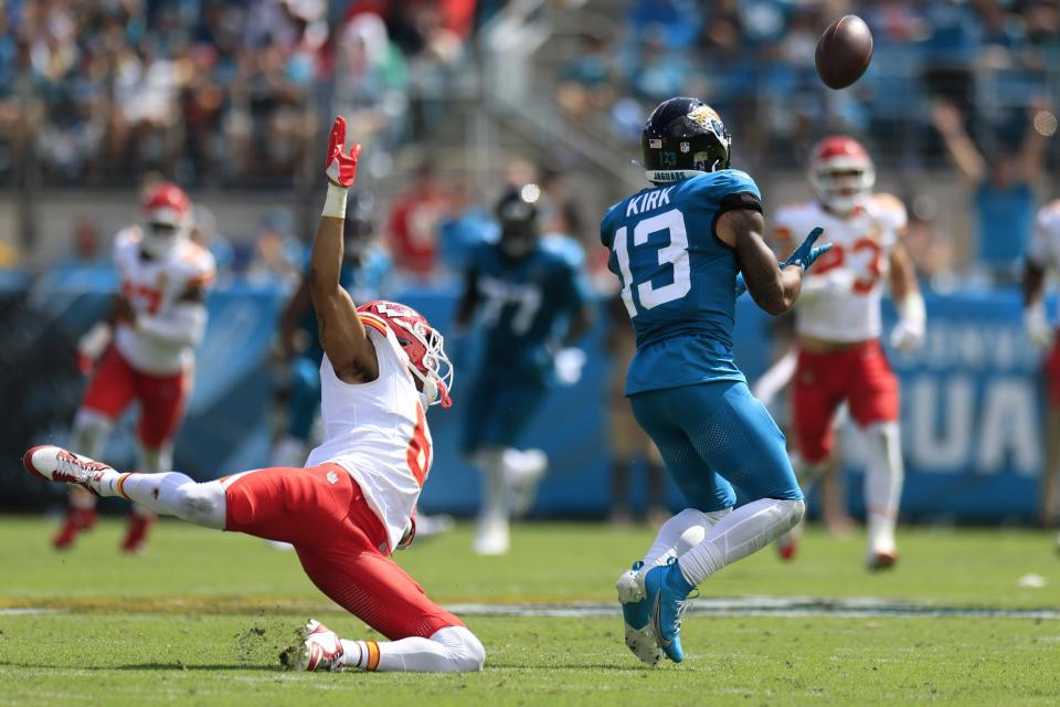 Jacksonville Jaguars wide receiver Christian Kirk (13) hauls in a reception against Kansas City Chiefs safety Bryan Cook (6) during the third quarter of a NFL football game Sunday, Sept. 17, 2023 at EverBank Stadium in Jacksonville, Fla. The Kansas City Chiefs defeated the Jacksonville Jaguars 17-9. [Corey Perrine/Florida Times-Union]