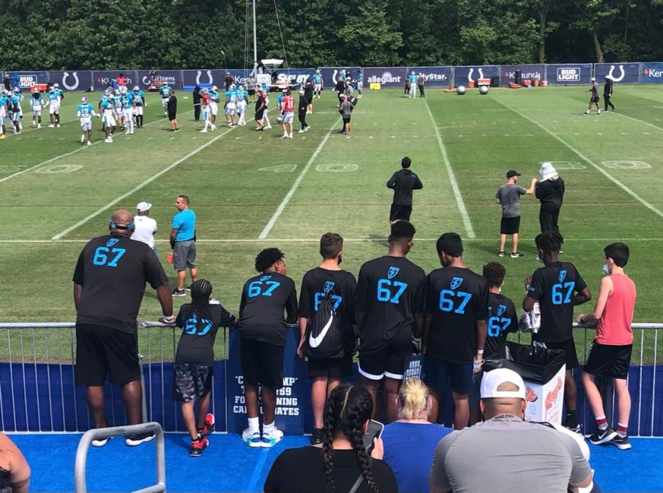 Brandon Hayes (left), former NFL lineman, Muncie Southside High School graduate and founder of 3rd & 11 Inc., took several local kids to watch a scrimmage between the Indianapolis Colts and Carolina Panthers.