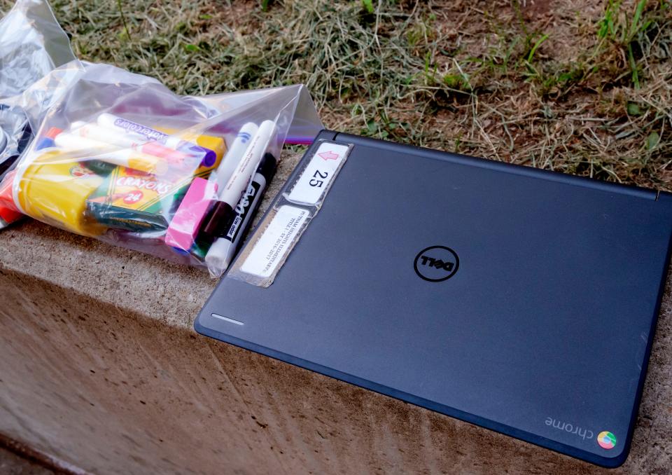 Oklahoma City Public Schools gave out Chromebooks and school supplies at a drive-thru electronic device pick-up at Eugene Field Elementary in Oklahoma City on Aug. 24. Enrolled students at each school received an iPad or Chromebook for virtual learning for the school year.