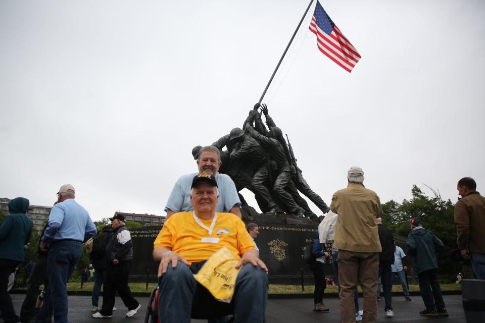 Marty Mitchel III, a Vietnam War veteran who served in the Marine Corp, and his guardian, Lest Black, pose for their picture at Iwo Jima, April 27, 2024.