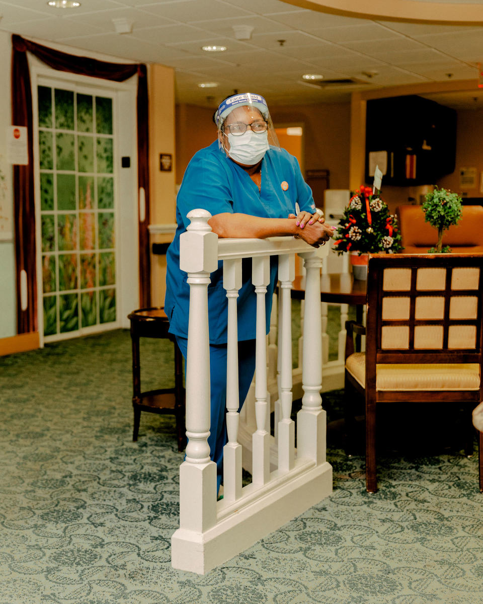 Lil Parks, a nurse’s assistant at Westminster and a Jamaica native, often sings Bob Marley songs to keep residents’ spirits up. She got her first shot the same day<span class="copyright">Evan Jenkins for TIME</span>