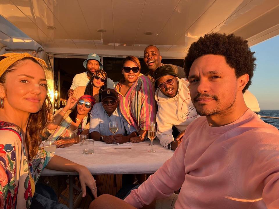 Minka Kelly and Trevor Noah with friends in South Africa