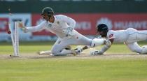 Cricket - Sri Lanka v South Africa - Second Test Match - Colombo, Sri Lanka - July 21, 2018 - Sri Lanka's Kusal Mendis is run out by South Africa's wicketkeeper Quinton de Kock. REUTERS/Dinuka Liyanawatte