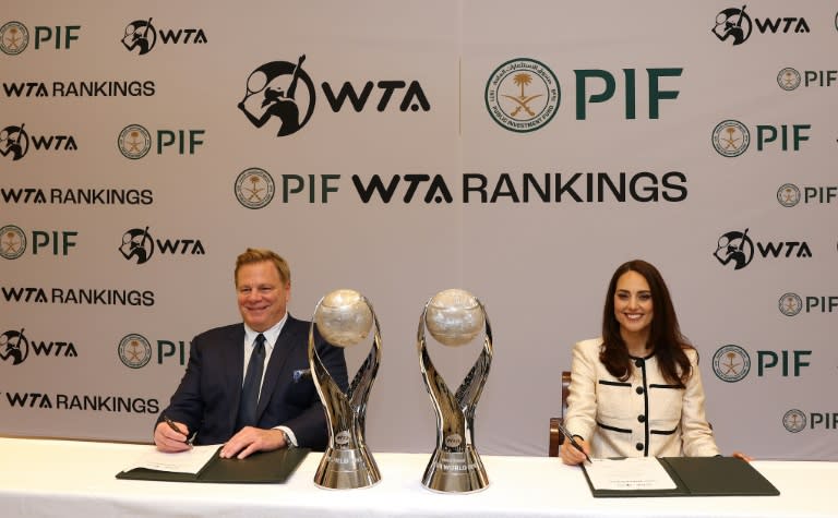Kevin Foster, Head of Corporate Affairs for the Saudi Public Investment Fund and and Marina Storti, chief executive of WTA Ventures, announce a new multi-year partnership between the women's tennis circuit and PIF (ELSA)
