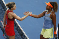 Tennis - Australian Open - Margaret Court Arena, Melbourne, Australia, January 22, 2018. Simona Halep of Romania shakes hands with Naomi Osaka of Japan after Halep won their match. REUTERS/Thomas Peter