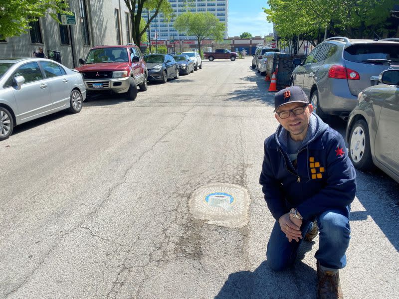 Chicago artist Jim Bachor creates four pandemic-themed pothole mosaics on the city's North Side